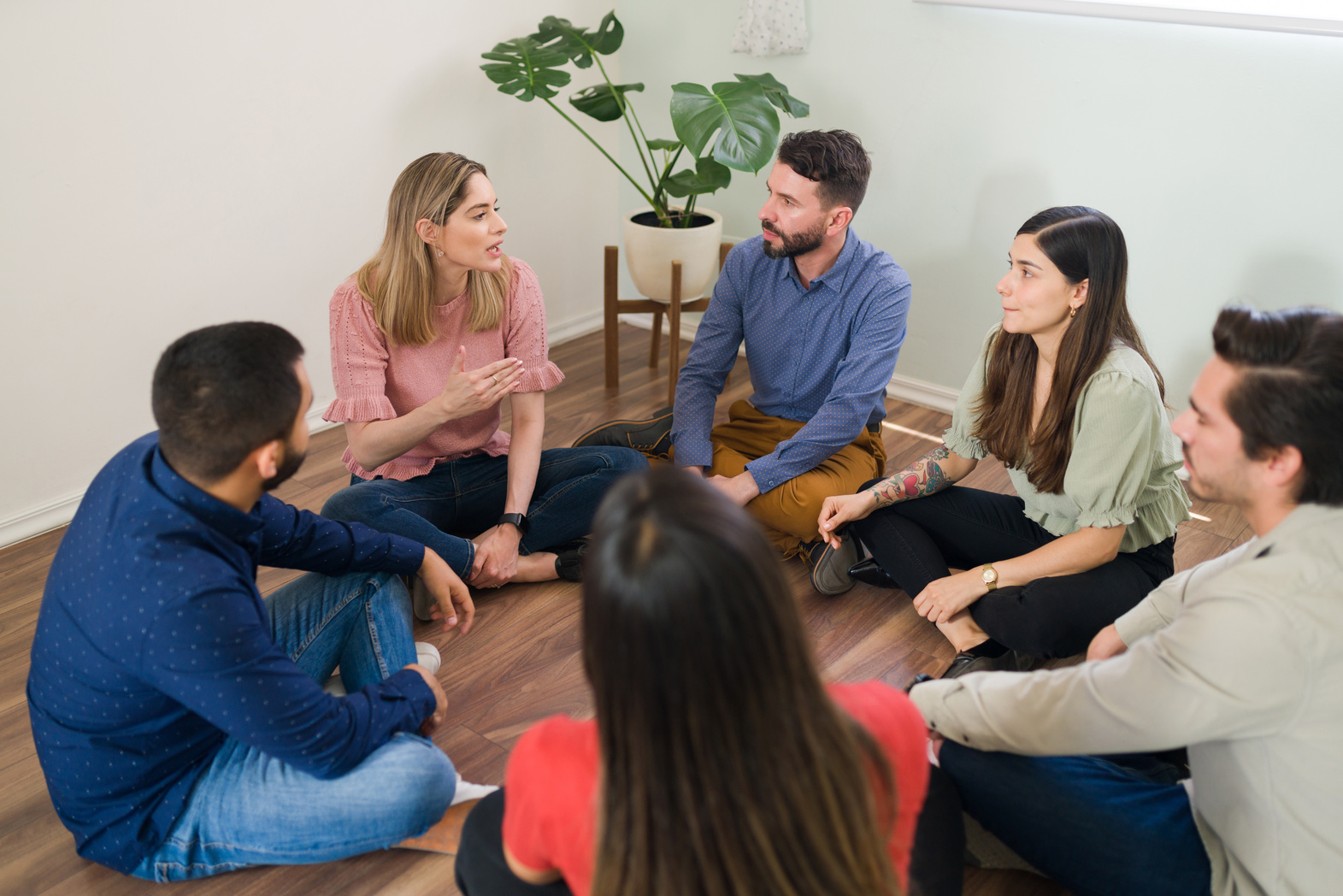 Support group having a conversation about mental health